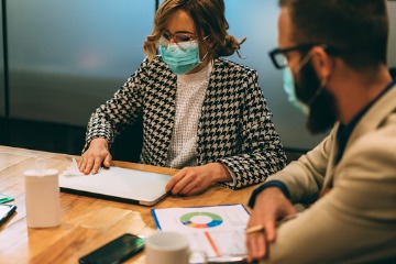 businesspeople-using-disinfection-wipes-during-covid19 360 x 240